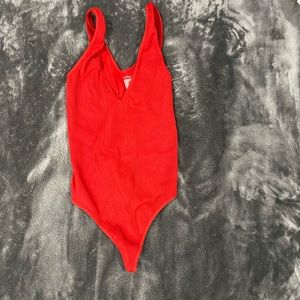 Red body suit